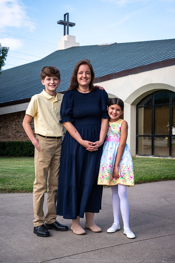 Stephanie and kids in front of St. Bartholomew