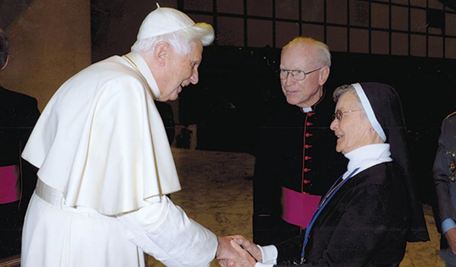 Pope Benedict XVI greets Sister Francesca on her 2009 visit to Rome.