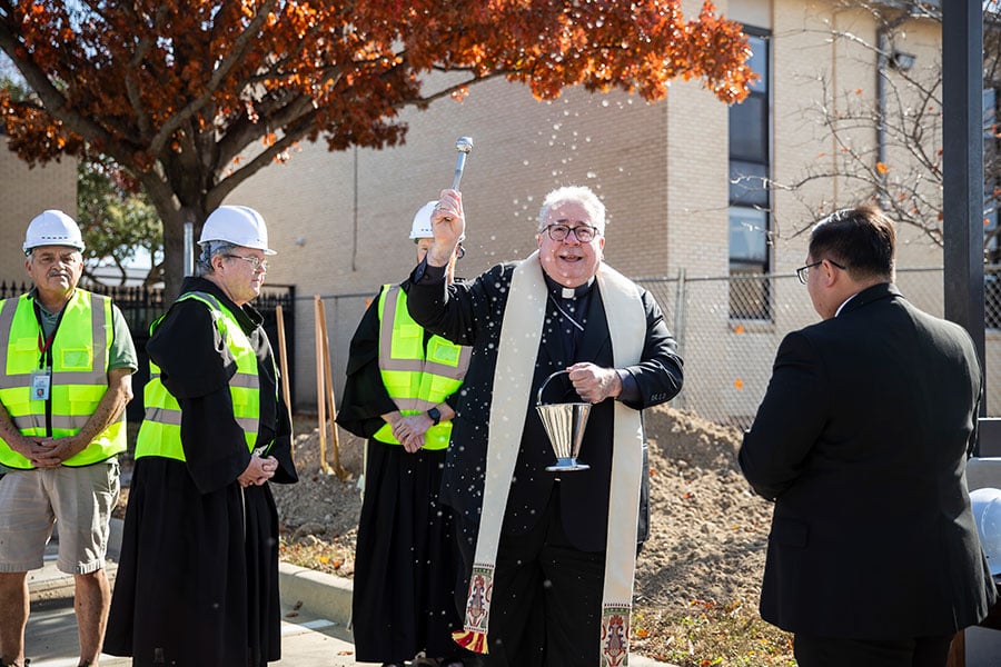 bishop sprinkling water