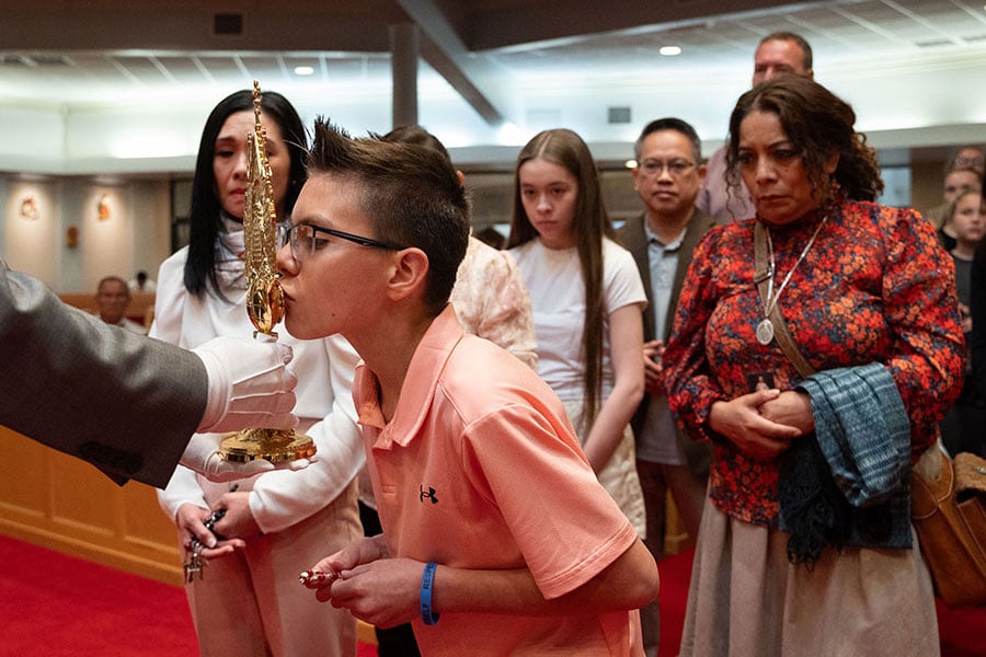 Parishioners venerate the relic of St. Faustina after the installation Mass for the relic, on April 12, 2026 at Our Lady of Fatima Parish in Fort Worth. (NTC/Ben Torres)