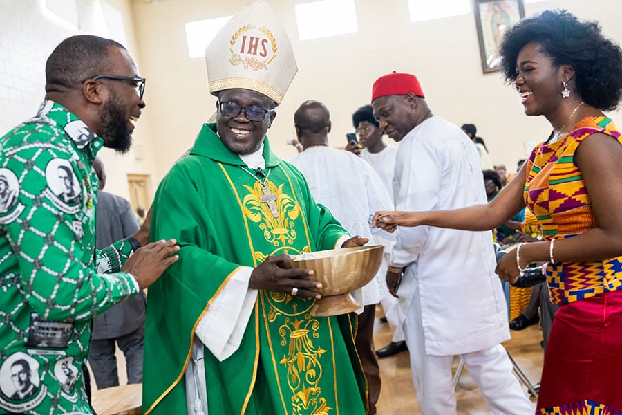 Archbishop Anokye holds collection bowl