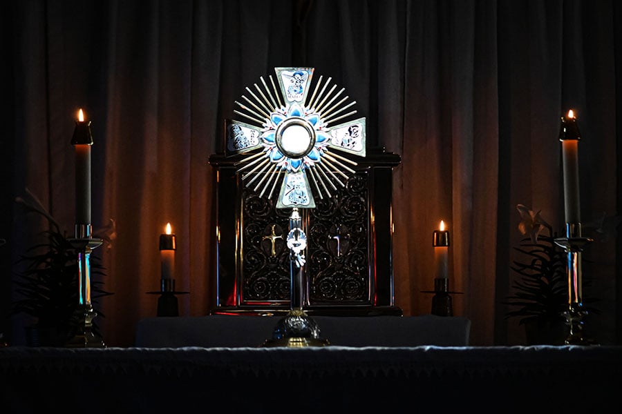 A monstrance amidst the darkness