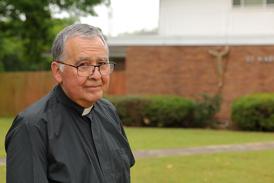 Father John Pacheco stands before St. Mary Parish in Gainesville. (NTC/Thomas Otto)