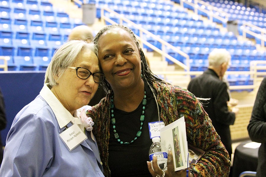 Sister Miriam Nesmith is hugged by a grateful Philipa Pinkard