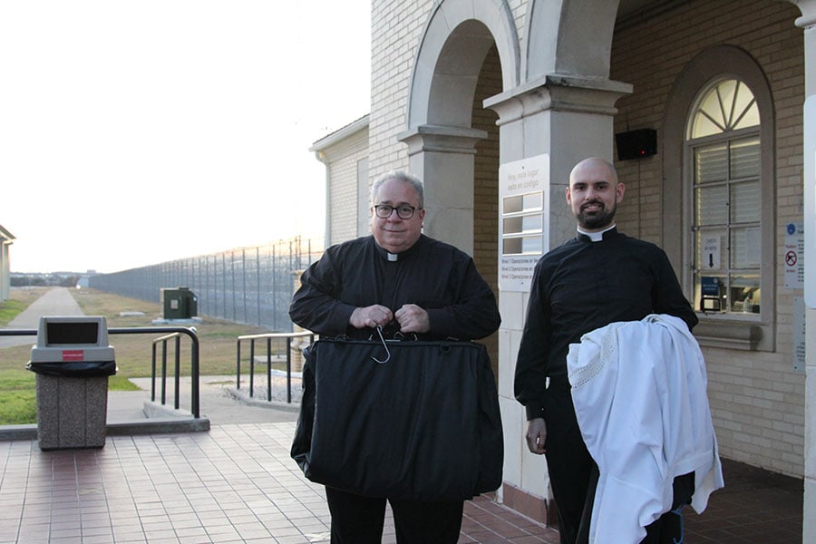 Bishop Michael Olson and Seminarian Jeffrey Ambreit Jr. stand before Federal Medical Center Fort Worth, a federal prison for about 1,500 make inmates, on Dec. 24, 2026. (NTC/Susan Moses)