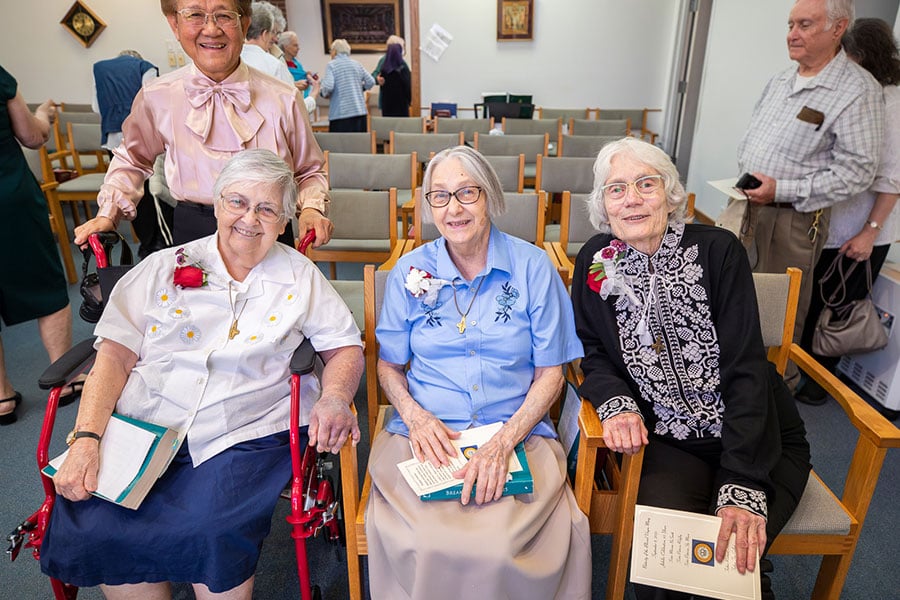 Sister Patricia Ste. Marie, Sister Miriam NeSmith, and Sister Patricia Ridgley pose for a photo after Mass on Sept. 8, 2025 at Our Lady of Victory Center. The three Sisters of St. Mary of Namur were honored for 65 years of religious life. (NTC/Juan Guajardo)