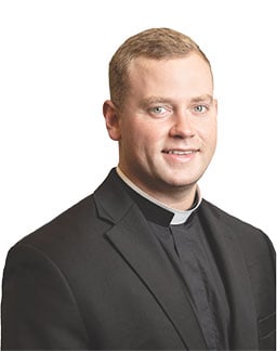 Father Brett Metzler