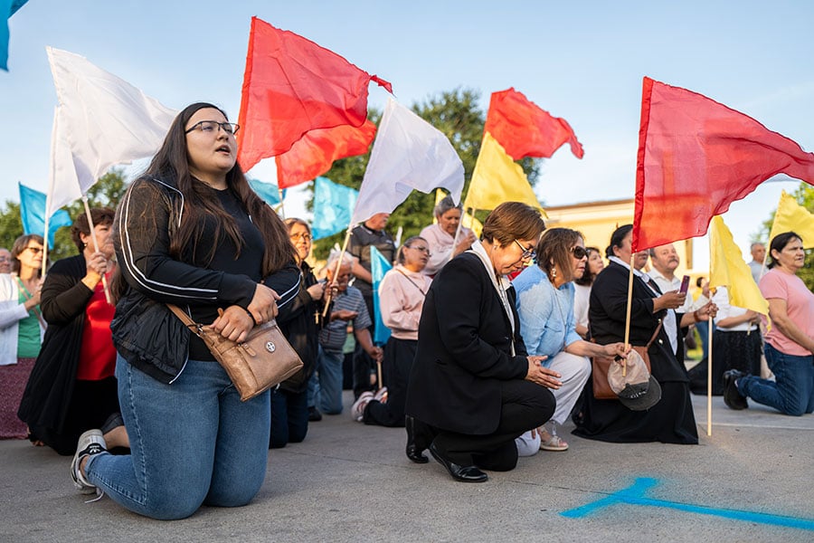 People pray during a Eucharistic pilgrimage