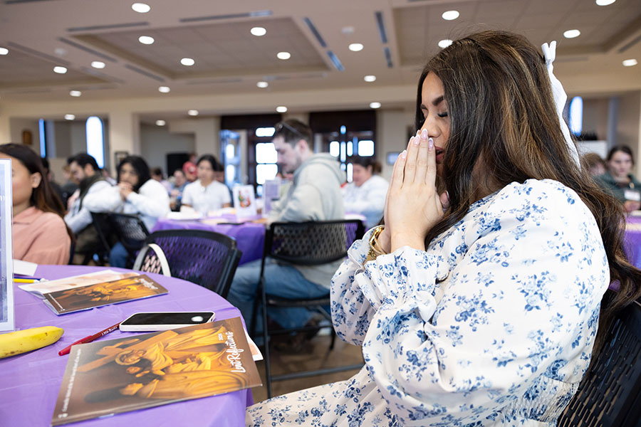 Giuseppa Sanfilippo prays during the Young Adult Retreat on Saturday, February 28, 2026 at St. Philip the Apostle Parish in Flower Mound. (NTC/Kevin Bartram)