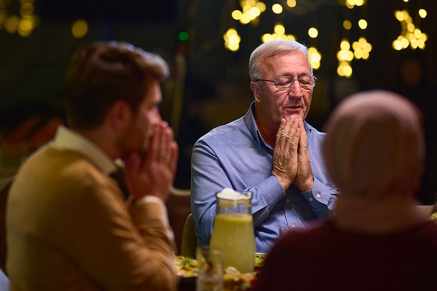 Family saying grace