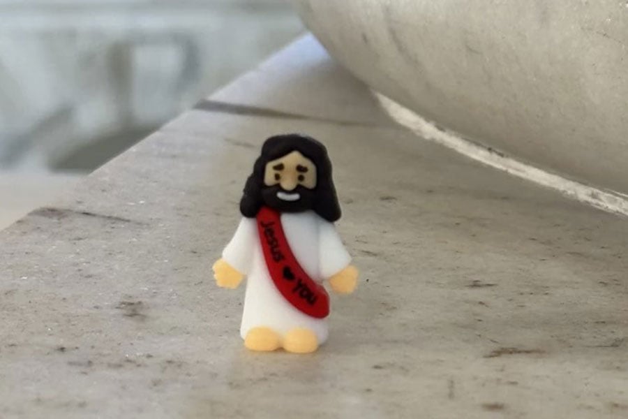 Tiny Jesus figure
