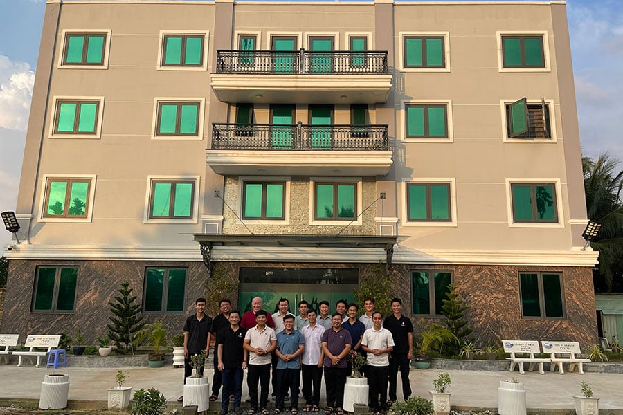 Spiritans stand before the Spiritan Center House in Hoc Mon, Vietnam. (courtesy photo/Missions Office of the Diocese of Fort Worth)