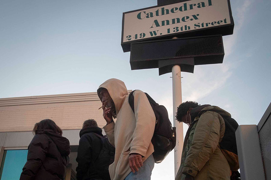 Homeless line up outside a Cathedral resource area
