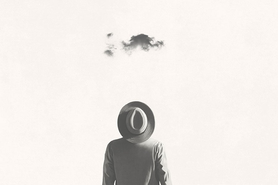 Man looks at cloud