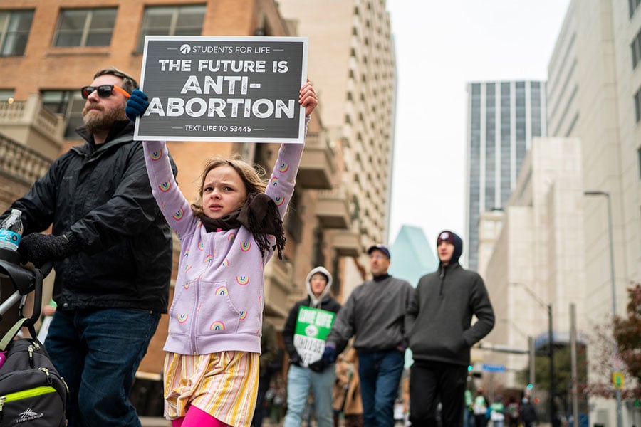 A young girl braves the cold weather as she participates in the North Texas March for Life on January 15, 2022 in Dallas. The march marked the 49th anniversary of the Roe v. Wade decision that legalized abortion in America. (NTC/Juan Guajardo)
