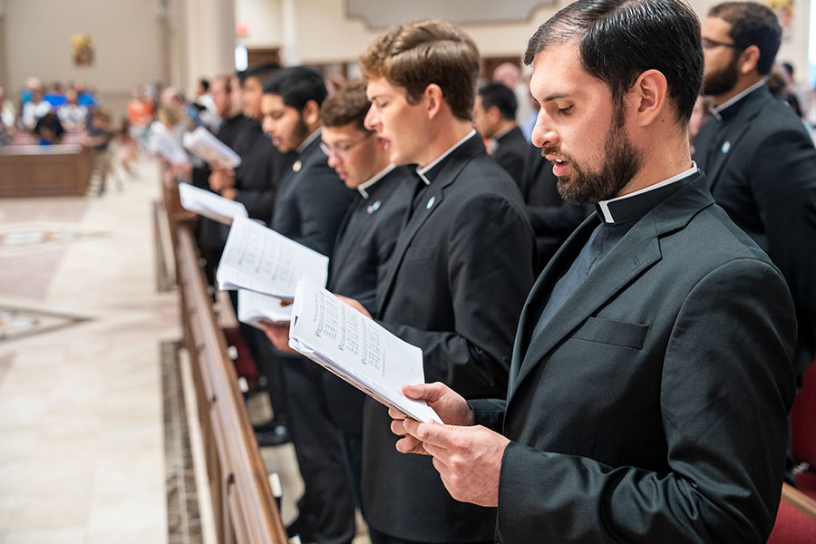 Seminarian Jeffrey Ambreit-Quepons sings alongside fellow seminarians after they were admitted to candidacy during Mass on the 18th Sunday of Ordinary time on August 4, 2024 at St. Mark Church. Their admission to candidacy marks the seminarians' entering the final stage of formation. (NTC/Juan Guajardo)