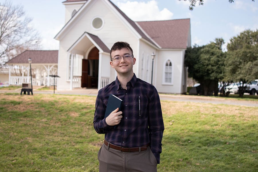 Walker Price stands in front of Christ the King Anglican Church at the kick-off of 40 Days for Life.